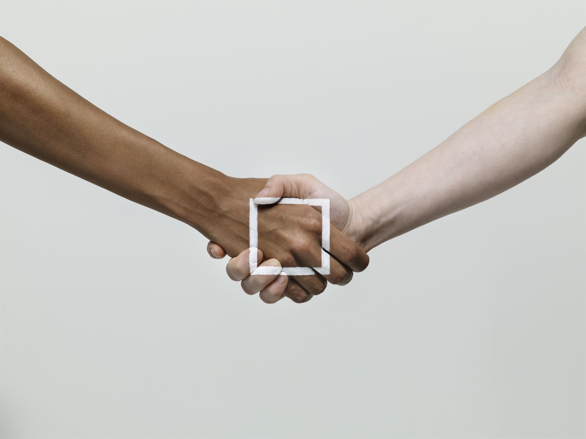 Handshake representing partnership